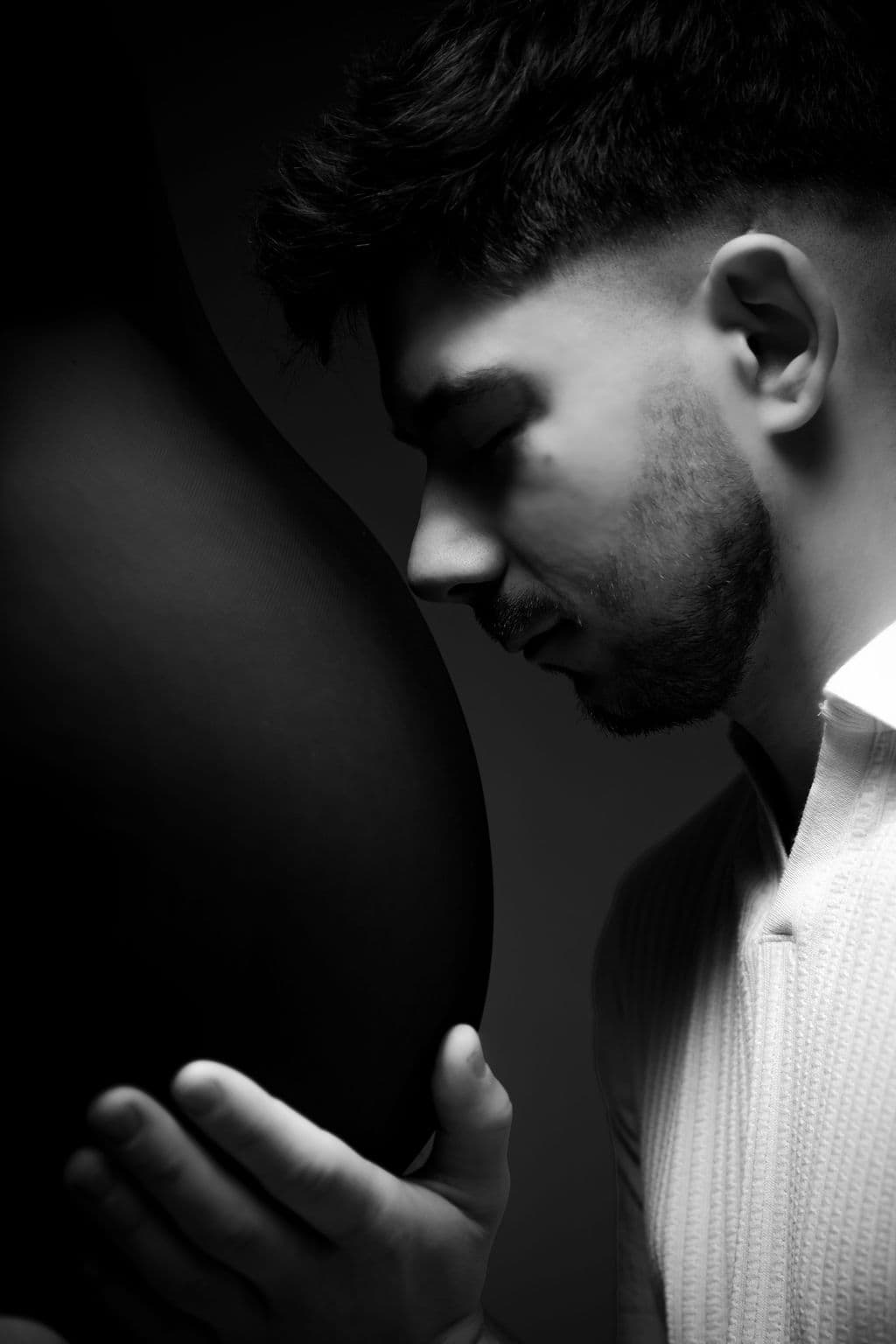 Tender maternity close-up in black and white